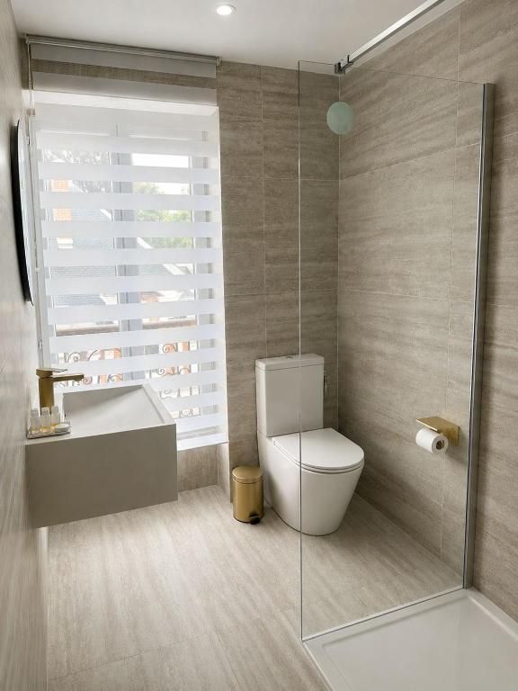 Salle de bain avec douche à l’italienne